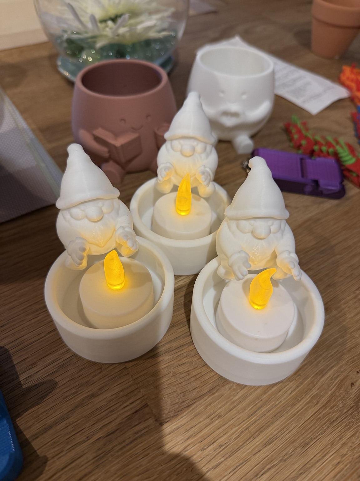 A little glow: Gnome holders shown with battery-powered LED tealights.